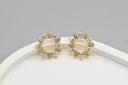 Radiant Sunburst Zircon Stud Earrings in Gold Finish