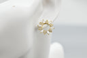 Radiant Sunburst Zircon Stud Earrings in Gold Finish
