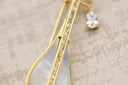Modern Gold & Pearl Sunburst Stud Earrings