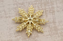 Spinnable Golden Snowflake Crystal Brooch