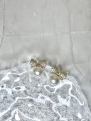 Sterile Silver Bow Pearl Stud Earrings with Cubic Zirconia